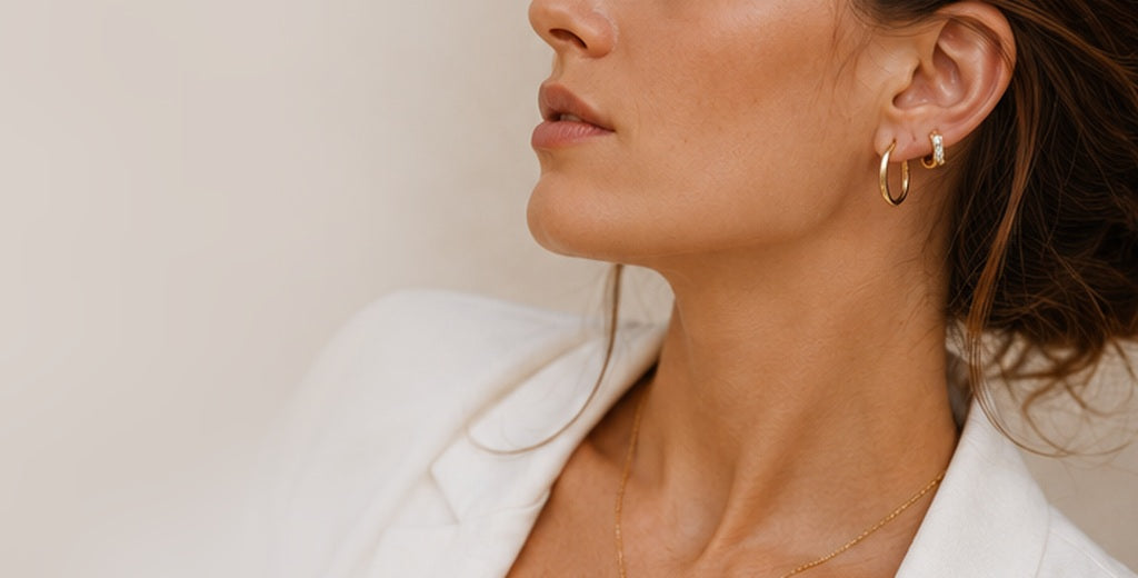 Woman wearing gold earrings